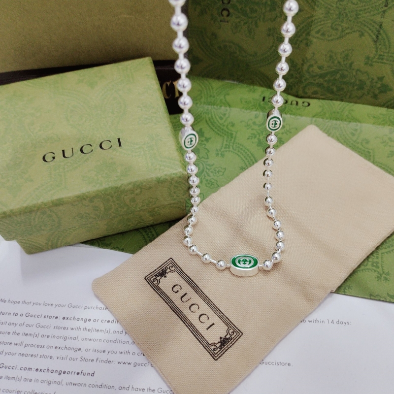 G*u*i necklaces